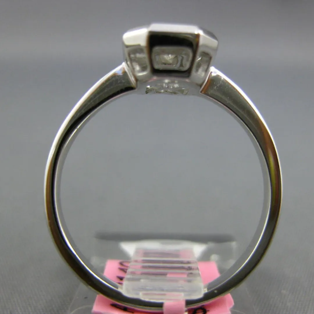 /public/photos/live/Baguette Cut Invisible Octagon Bezel Engagement Ring 571 (5).webp